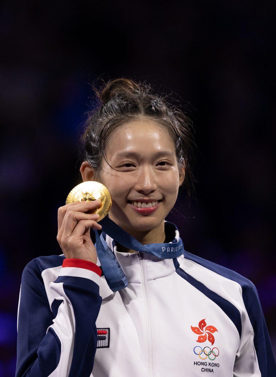 Gold medalist Man Wai Vivian Kong of Team Hong Kong celebrates on the podium during the Women